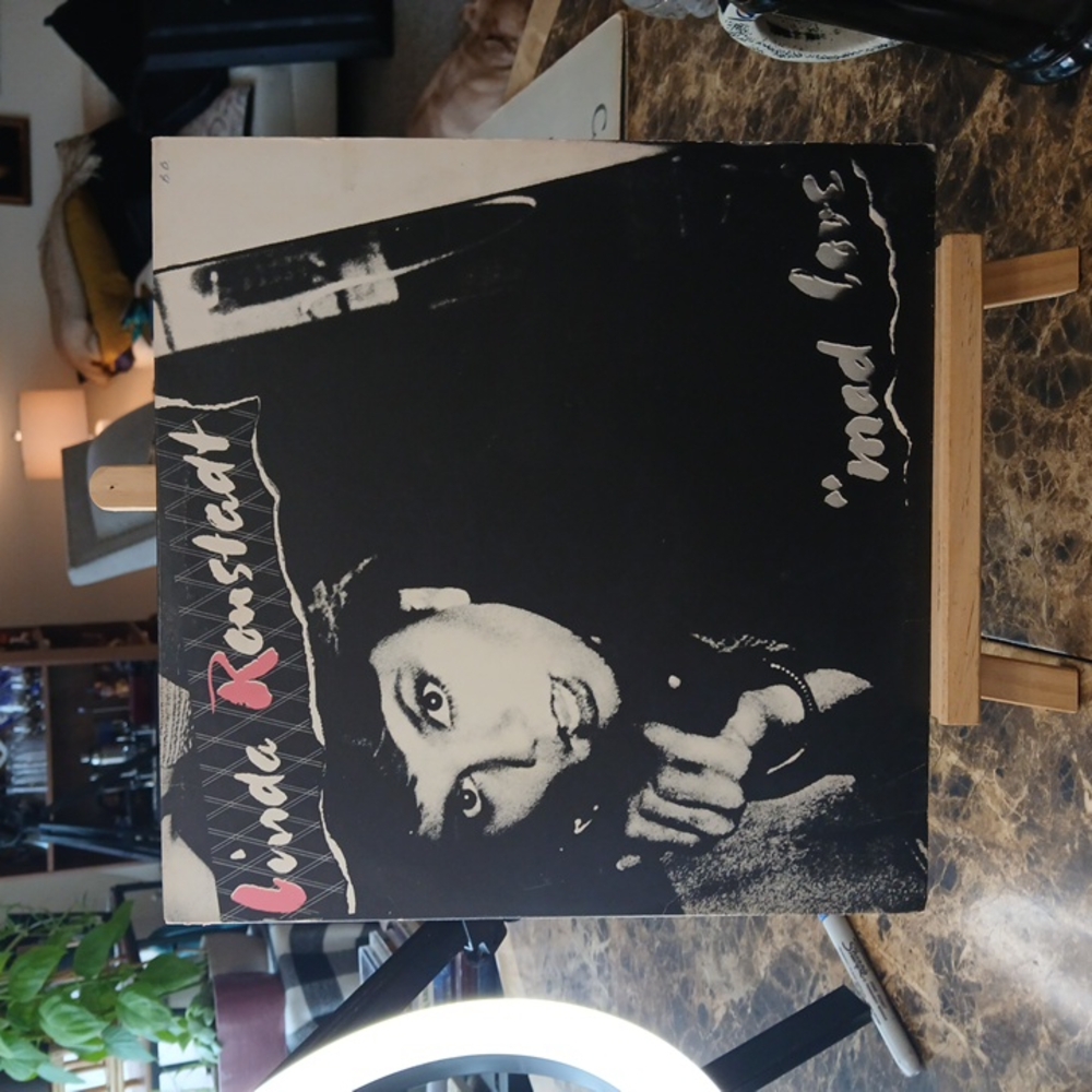 This is a Linda Ronstadt "Mad Love" vinyl record, a first pressing 1980